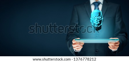 Digital tablet face detection and identification (ID) concept. Facial recognition protection and security.