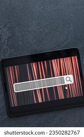 Digital tablet with internet browser search bar on screen.
