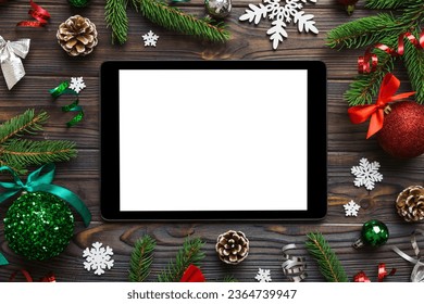 Digital tablet mock up with rustic Christmas decorations for app presentation top view with empty space for you design. Christmas online shopping concept. Tablet with copy space on colored background. - Powered by Shutterstock