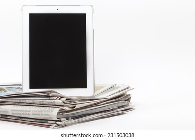 Digital Tablet And Newspapers, Internet And Electronic Online News Concept Image 