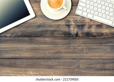 Digital Tablet Pc, Keyboard And Cup Of Coffee On Wooden Table 