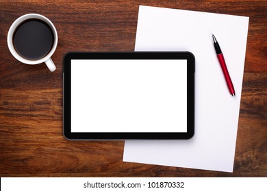 Digital Tablet Pc On Business Desk With Blank White Screen