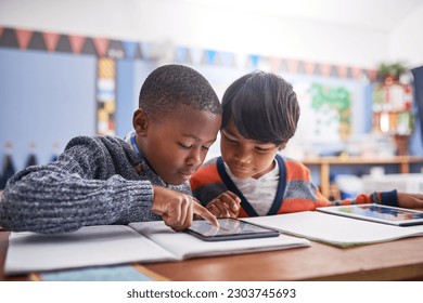 Digital tablet, school and students in classroom doing research for work, test or exam. Technology, education and boy children friends working on project or assignment together with mobile on campus. - Shutterstock ID 2303745693