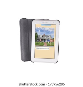 Digital Tablet with Text Message 'We closed the Deal. We sold the house today' Photo of Sold Suburban Home in residential neighborhood USA held by Adult wood mannequin isolated on white background