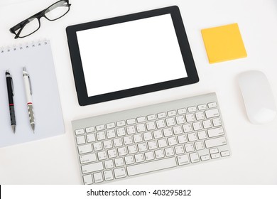 Digital tablet touch pad computer with keyboard, mouse in office table business