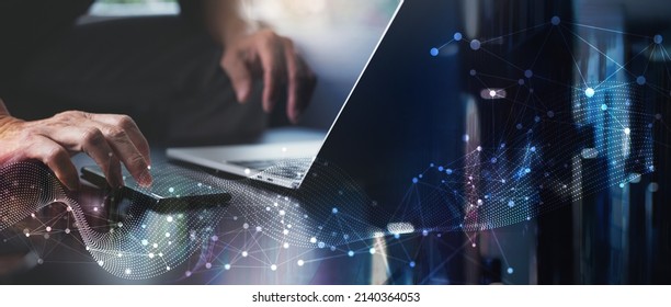 Digital technology, big data, internet network connection, futuristic innovation technology background. Man using mobile phone and laptop and smart city - Shutterstock ID 2140364053