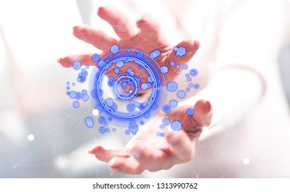 Digital technology concept between hands of a woman in background