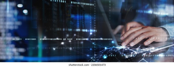 Digital technology concept. Man programmer working on laptop for big data management, computer code on futuristic virtual interface screen, data mining, digital software development - Shutterstock ID 2206501473