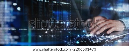 Digital technology concept. Man programmer working on laptop for big data management, computer code on futuristic virtual interface screen, data mining, digital software development