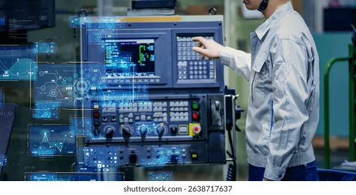 Digital technology concept with worker operating control panel in factory