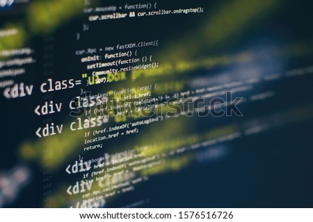 Digital technology on display. HTML5 in editor for website development. Website HTML Code on the Laptop Display Closeup Photo.
