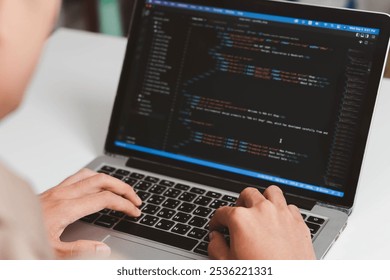 Digital technology, software development concept. Developing programmer, software developer coding computer code on laptop computer. Perfect for coding, IT solutions, applications, coding javascript