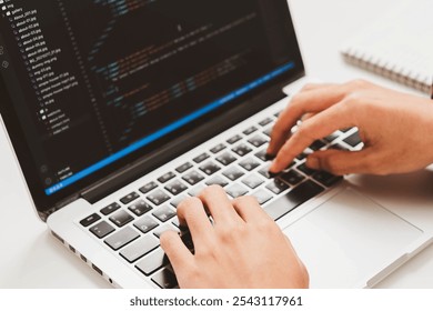 Digital technology, software development concept. Developing programmer, software developer coding computer code on laptop computer. Perfect for coding, IT solutions, applications, coding javascript
