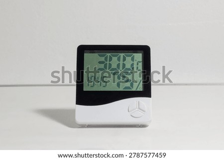 Digital Thermometer and Hygrometer Displaying Temperature and Humidity. Temperature Hygrometer. High quality photo