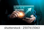 Digital Traffic Growth Analysis, Business Professional Using Advanced Technology to Monitor and Enhance Website Performance for Increased Traffic and Online Visibility in a Competitive Market