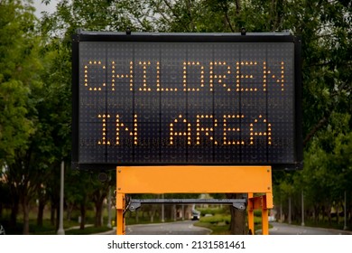 Digital Traffic Sign Stating Children In The Area