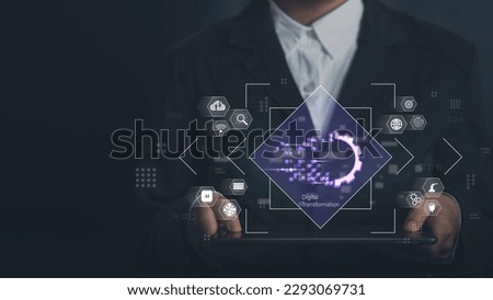 Digital transformation concept. Connection next generation technology era. Businessman hold tablet show futuristic blue gear transform growth business and modern artificial intelligence and big data.