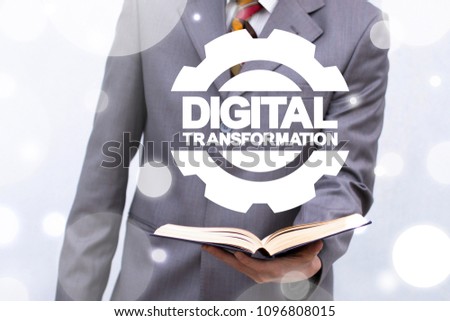 Digital Transformation Education Business Technology. Digitilization. Digitization Learning concept. Man offers book with gear and digital transformation words.
