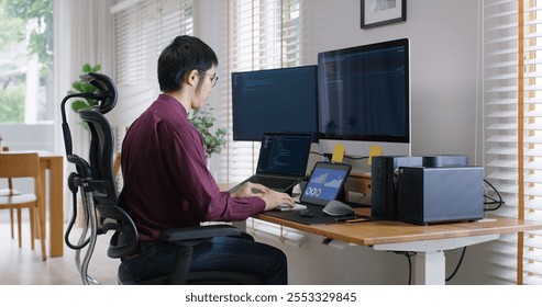 Digital transformation future workforce web DEV career development. Asia people young talent man busy work at home office reskill upskill martech job remote test on AI cloud computing cyber security.