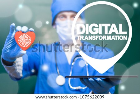 Digital Transformation Health Care concept. Doctor offers tablet pc with digital transformation location icon and heart with circuit board sign on a virtual interface. Medicine Digitalization.