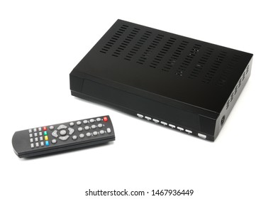 Digital TV tuner with remote control on an isolated white background - Shutterstock ID 1467936449