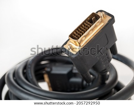 Digital video cable for connecting a monitor, TV, projector, display, DVI connector, connecting to a video card, close-up