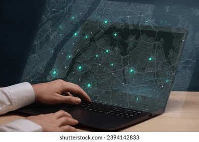 Digital visualization of big data on New York map background, futuristic technology and network connection, big smart city virtual database, Businessman working with laptop computer and navigation