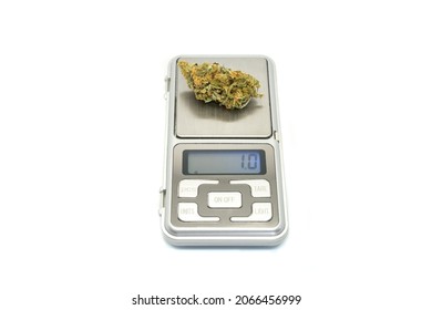 Digital Weight Weighing Marijuana Buds Isolated On White Background. A Gram Of Cannabis On Digital Scale.