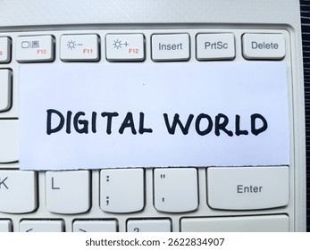 Digital world writting on laptop keyboard background.