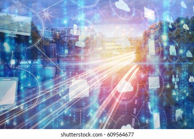 Digitally composite image of technological interface against light trails on city street 3d