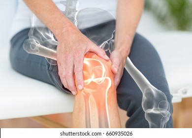Digitally generated image of man suffering with knee pain 