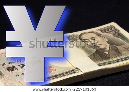 Digitally rendered sign of a large Japanese Yen symbol. A banded stack of 10,000 yen bills for a total of 1,000,000 JPY in the background. Foreign currency exchange concept. 