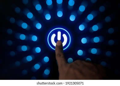 Digitization Idea, Human hand pressing start button to power on the newest technology, Artificial Intelligence, Futuristic, Machine Learning, Launching futuristic machine, People living with Machine