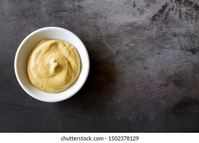 Dijon Mustard in a Bowl on a Concrete Background - Shutterstock ID 1502378129