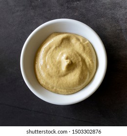 Dijon Mustard in a Bowl on a Concrete Background - Shutterstock ID 1503302876