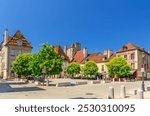 Dijon old town, Place des Cordeliers square in Dijon city historical centre with old typical houses medieval buildings and green trees in sunny summer day, Bourgogne-Franche-Comte region, France