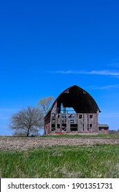 A dilapitated barn in springtime