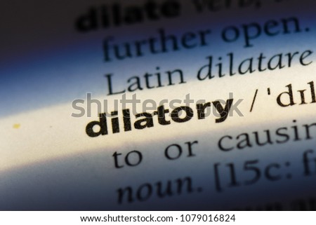 dilatory word in a dictionary. dilatory concept