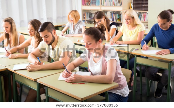 Diligent College Students Sitting Their Desks Stock Photo Edit