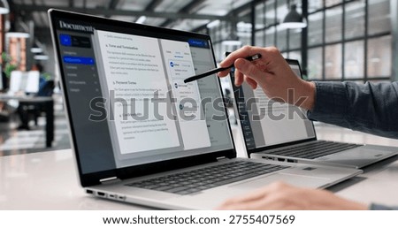 Diligent Professional Systematically Arranges Digital Documents On Laptop For Efficient Retrieval