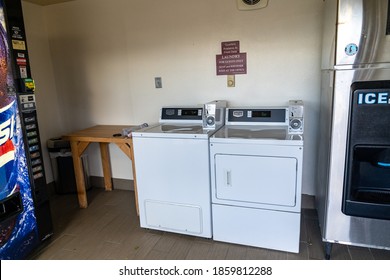 Dillon, Montana - June 30, 2020: Washer And Dryer For Guest Laundry At A Hotel. Ice Machine And Soda Vending Machine On Edge Of Frame