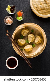 Dim Sum Dumplings In Steamer And Ingredients Top View