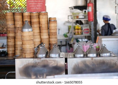 Dim Sum Shop With Steaming Bamboo Baskets