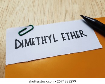 Dimethyl ether writting on table background.