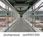 A diminishing perspective of an industrial pedestrian walkway 