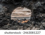 Dimmuborgir, large area of unusually shaped lava fields east of Mývatn in Iceland. Volcanic caves and rock formations, tourist attraction, autumn colors.