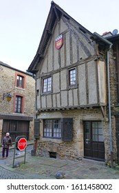 DINAN, FRANCE -29 DEC 2019- View of a Normandy style Middle Ages Tudor building with wooden beams in Dinan, a picturesque medieval town on the River Rance in the Cotes d'Armor, Brittany, France.