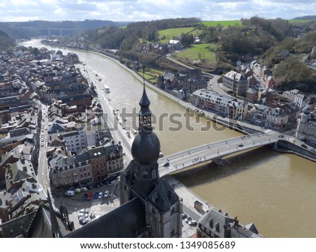 Dinant in Belgium a picturesque city with stone cliffs on the Meuse river