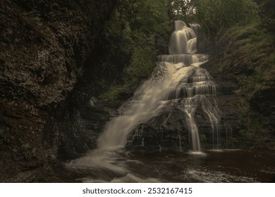 Dingmans Falls cascade down the mountain after a storm