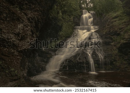 Dingmans Falls cascade down the mountain after a storm
